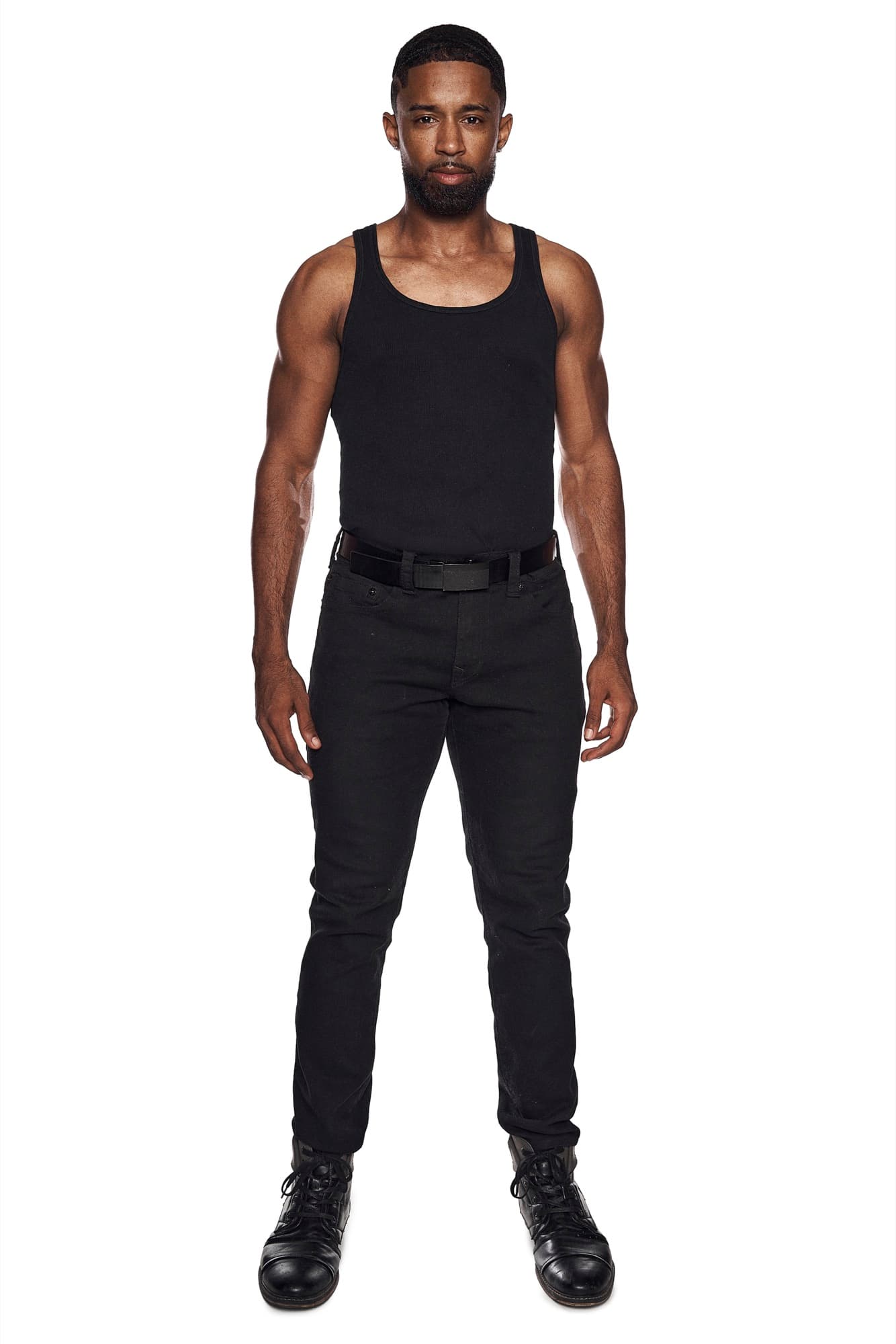 Full length digital of Abyon Ausar in a black tank and jeans against white