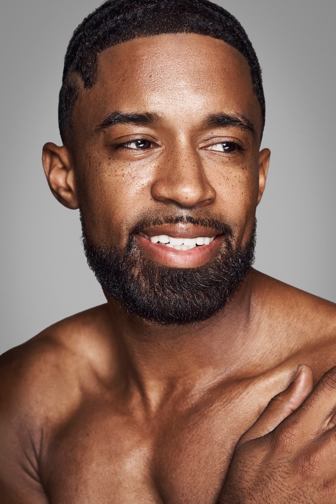 Smiling commercial portrait of Abyon Ausar