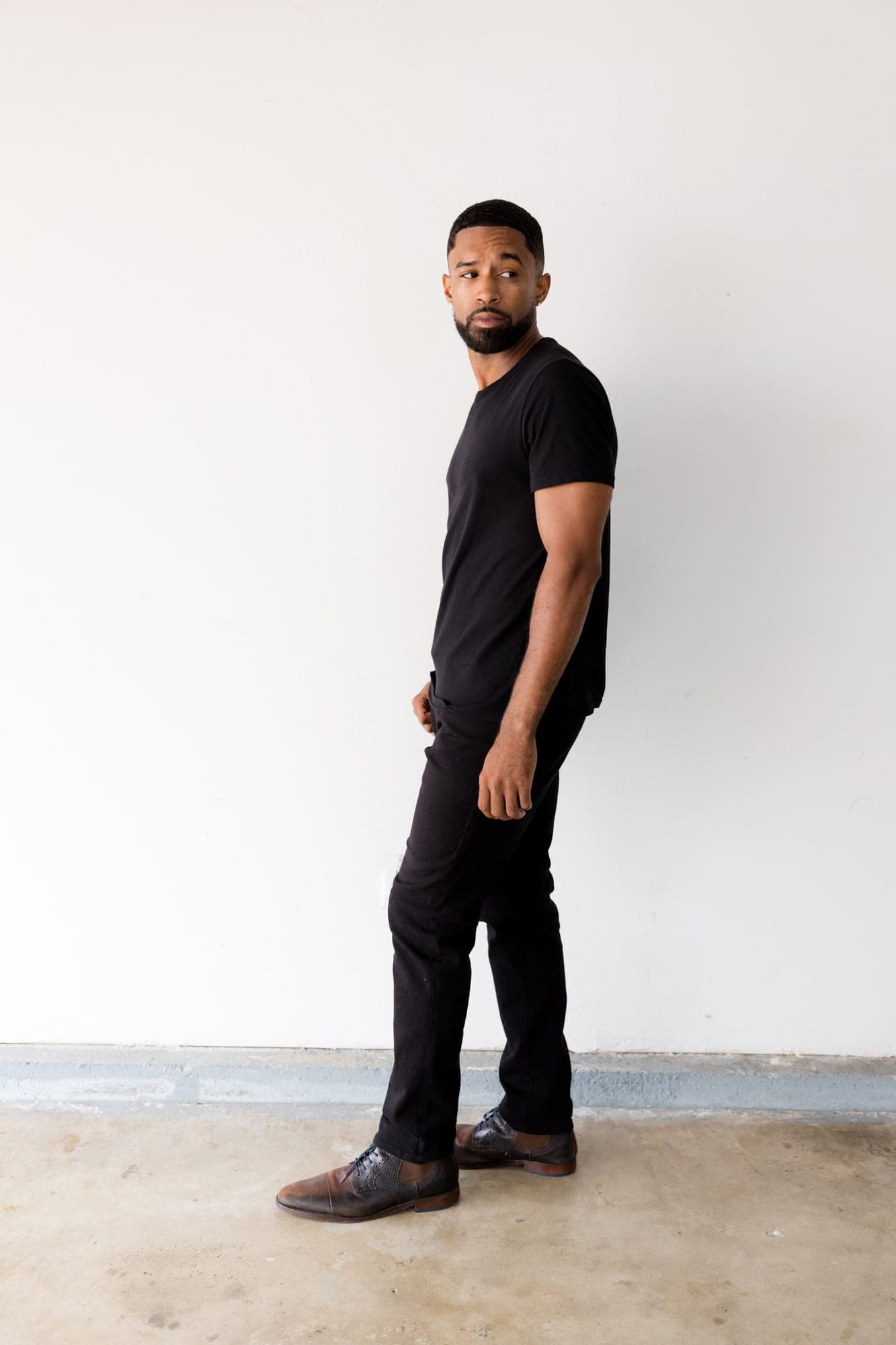 Full length profile digital of Abyon Ausar against a white wall